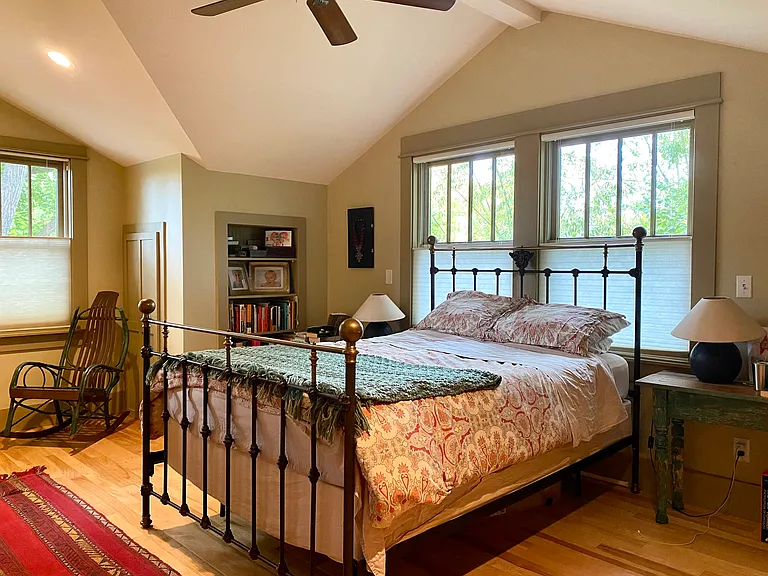 Primary bedroom is upstairs with a walk-in closet, built in bookcases and additional storage closets