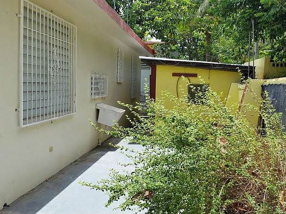 Back side yard with storage facilities