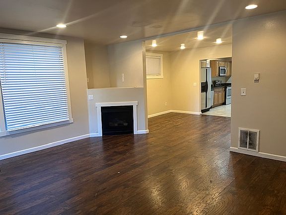 LIVING ROOM, BEAUTIFUL FIREPLACE.