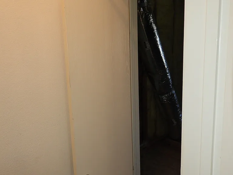 Attic access for additional storage space through closet at Bedroom #3.