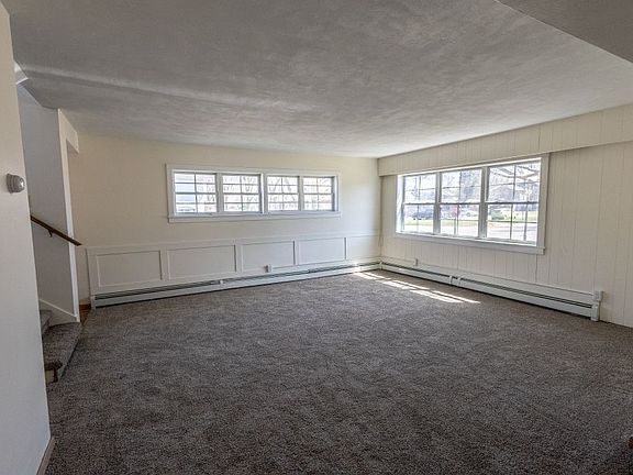 The living room is large and sunny.