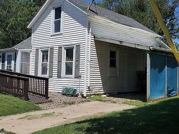 Right side with carport.