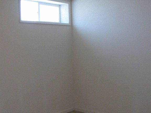 Bedroom with tile floor