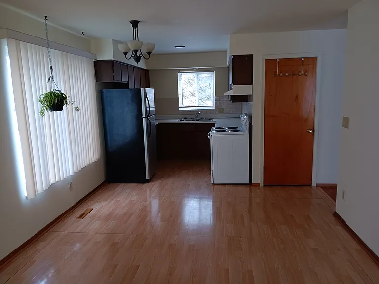Large dining by kitchen has basement access, Large windows, clean paint, LED lights.