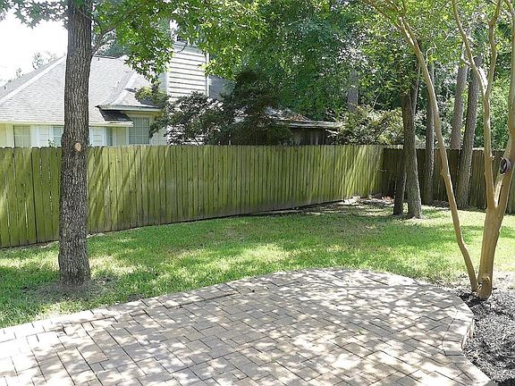 Mature shade trees in both the front and back yard.  Room for pets and comfortable entertaining.  The paver patio is partially c