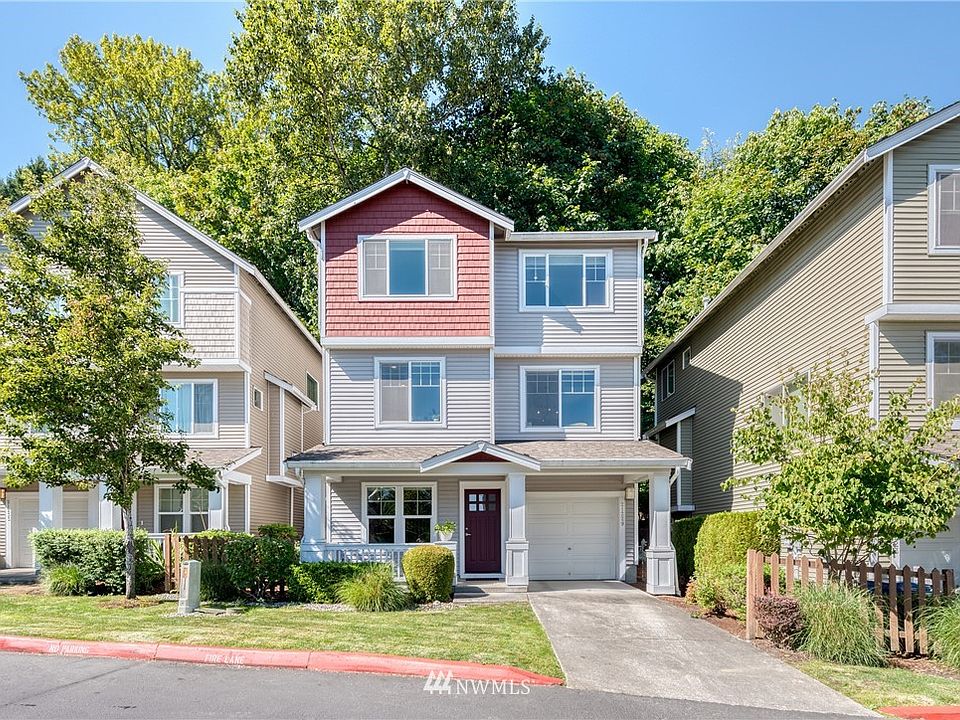 Charming immaculate home perched high above the valley with spectacular Cascade Mountain & valley views! Be awed by this stunning light & airy detached townhome with elegant finishes & details. First floor with new interior paint, living/flex space, half bath & laundry room. Second floor accented with rich cherry hardwood flooring, soaring 9' ceilings, striking designer light fixtures & large vinyl windows with Western exposure for natural light galore! Open living room & flex space great as a home office with newly installed recessed lighting. Chef's kitchen with warm maple cabinetry, granite countertops, stainless appliances & walk-in pantry. Top floor with master bedroom + full bath with dual vanity sinks + 2 additional bedrooms for all the views! Luxurious ensuite 5-piece master bathroom with marble countertops & soaking tub surround, shower, private lavatory & walk-in closet. Tandem 2-car garage. No rental cap. Commuter's dream home minutes away to I-5, airport, Westfield shopping
