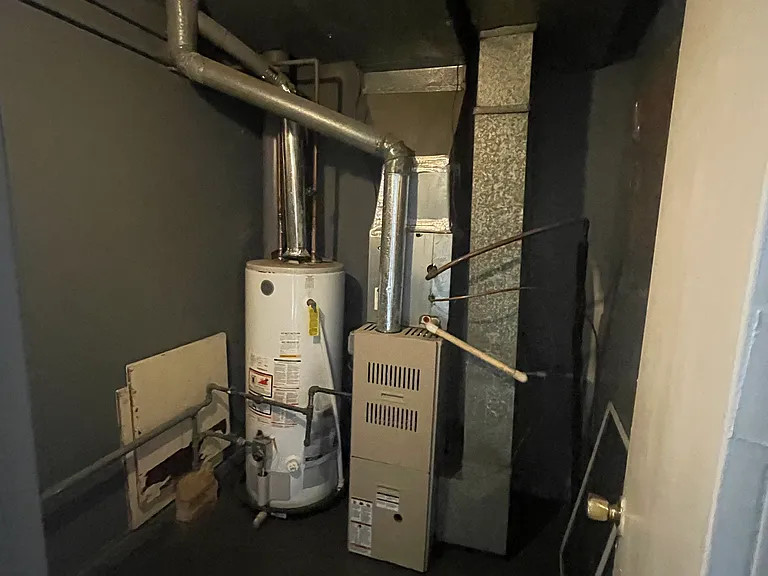 Individual Hot water tank. and Heat and Central air, controlled by this unit...