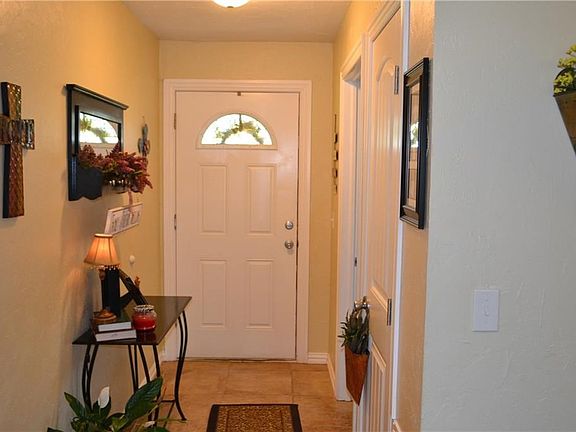 Foyer with laundry room to the right.