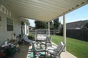 Double wide covered patio is large. Great for entertaining!