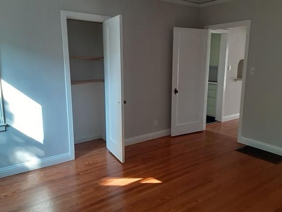 Spacious bedroom with beautiful hardwood floors!