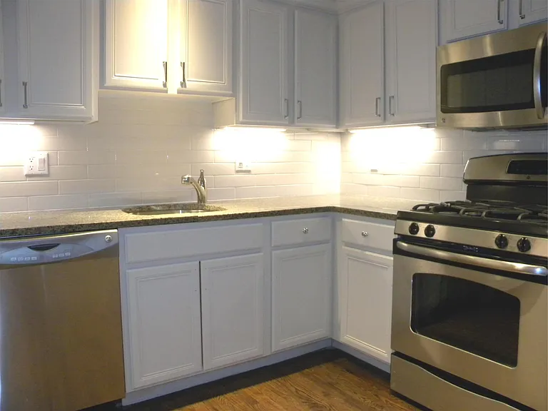 Separate Kitchen Area w/Granite Counters and Stainless Steel Appliances