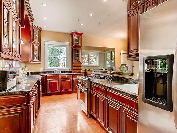 Huge kitchen with high end appliances.