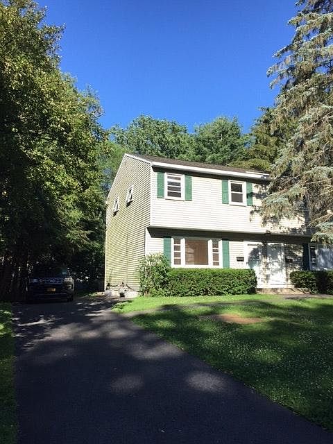Duplex, left side, dedicated driveway