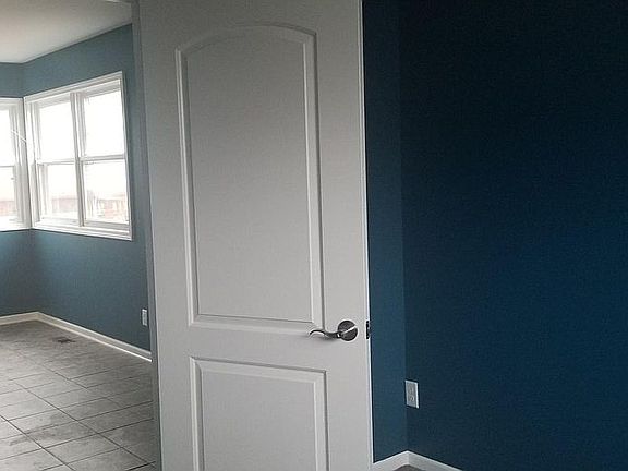 Doorway dividing the 4th bedroom and the family room.