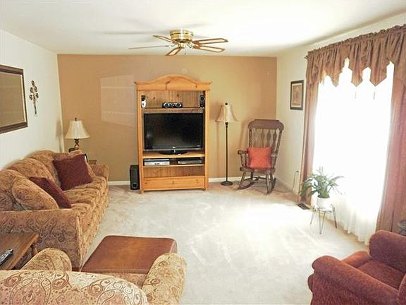 Fan in Family room that opens to the kitchen