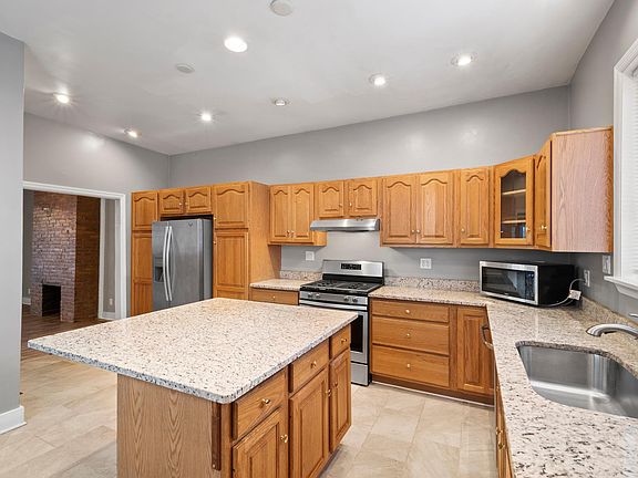 Kitchen with Granite Counters and Island