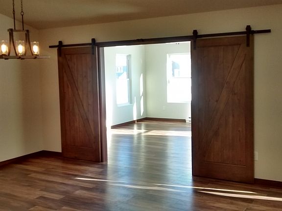 Barn doors into sunroom