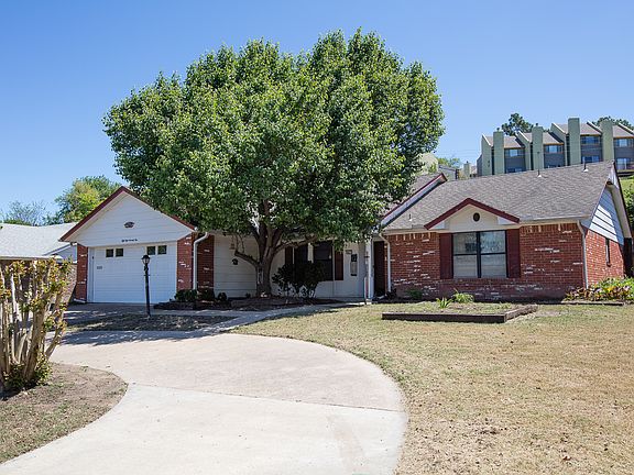 Charming circle drive enhances the curb appeal of this well-maintained home.