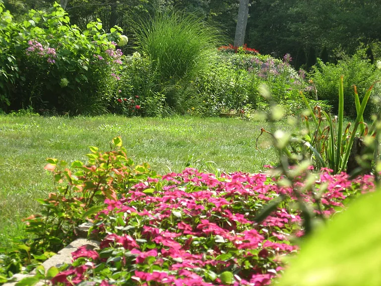 EXTENSIVE FLOWER GARDENS