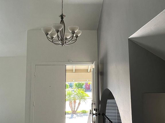 Entrance of home on main level looking out to front yard