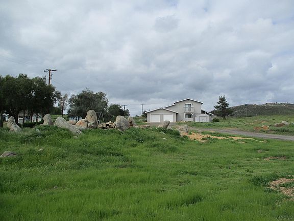 Two Story home with two car garage and storage.