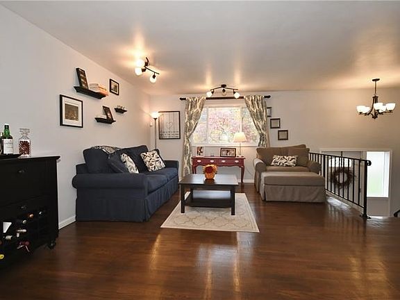 Who says a split-level is a sacrifice on space? This LARGE open family room fits lots of furniture!