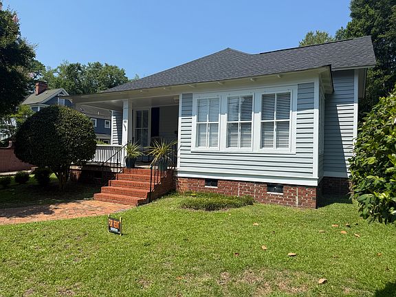 front view of house showing sunroom
