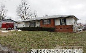 Front with 2 car garage