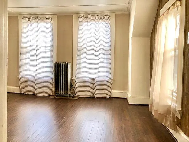 Living Room w/new hardwood floors and lots of light