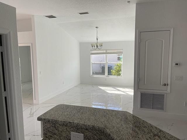 Spacious dining room area, making it the perfect setting for family and friends.