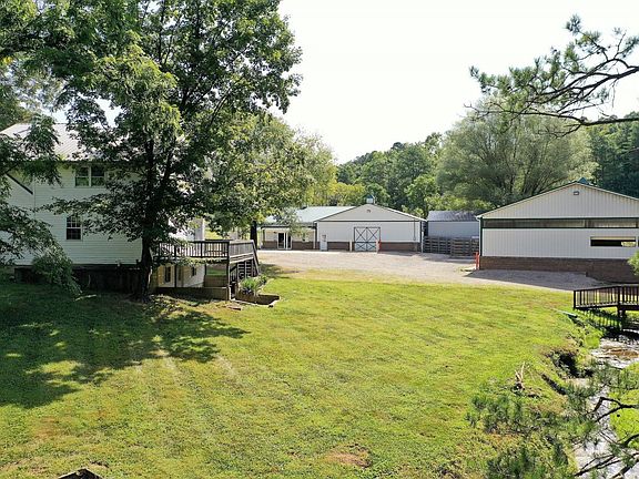 View across the back yard of the home and meat processing operation