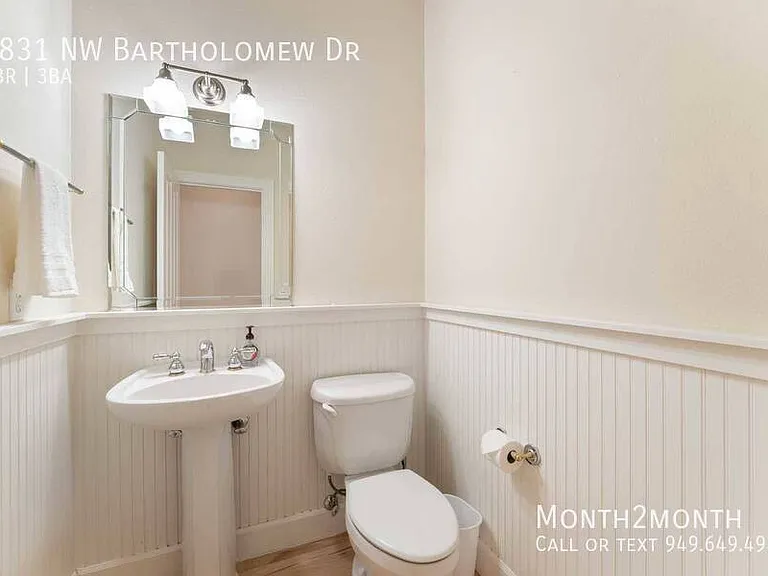 9831 NW Bartholomew Dr — Photo 24