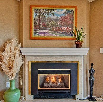 Warm up your winters with the gas fireplace! There is also tv/cable hook up behind the painting.... all ready for your entertainment center.