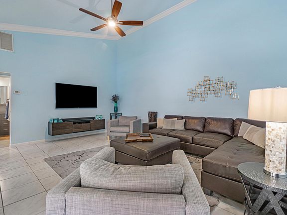 4th image of 5549 Grande Palm Cir