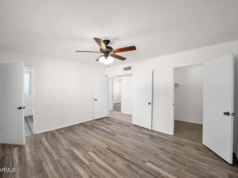 Master bedroom, en suite bathroom and walk-in closet.