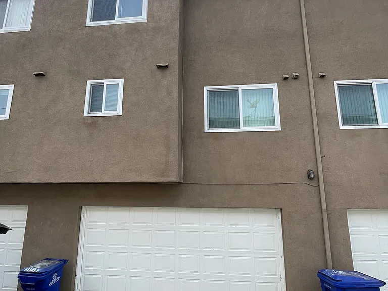 Double garage with automatic door control.