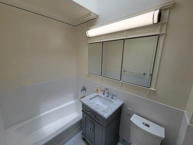 Upstairs bathroom, separate tub, medicine cabinets