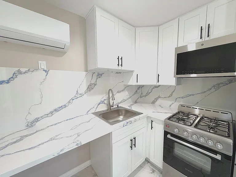 7443 Penfield Ave — Photo 5