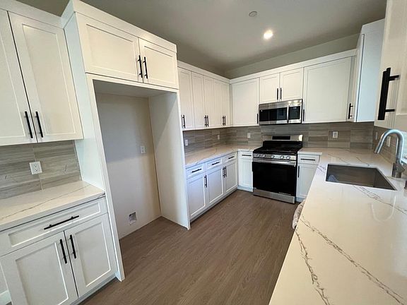 No refrigerator included.