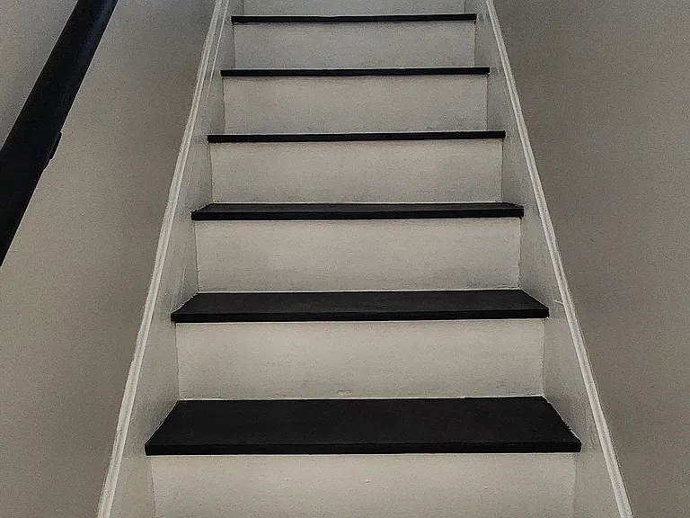 Stairs leading to 3rd floor.