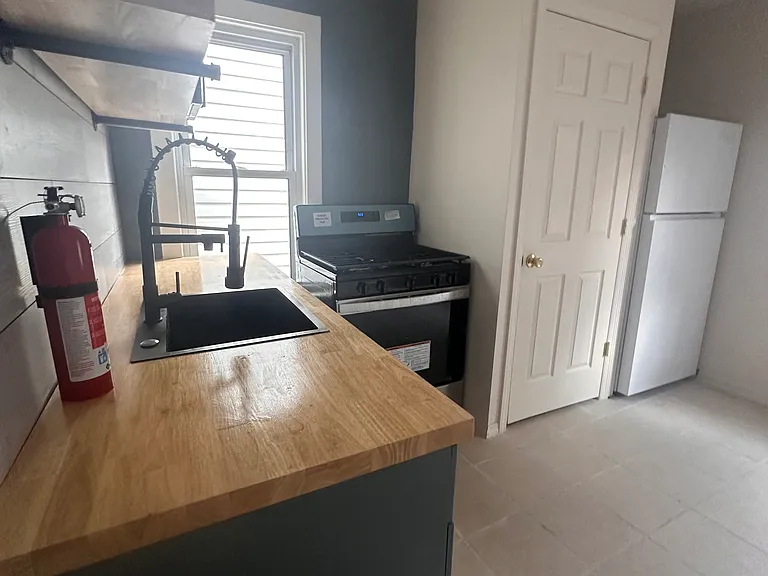 Spacious kitchen with room for dining, abundant closet space, and modern appliances.
