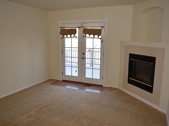 formal living room with gas fireplace