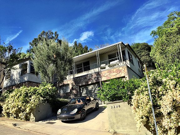 Corner lot on cul de sac features privacy and commanding vie