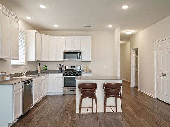 Spacious and Bright Kitchen in Model Representation