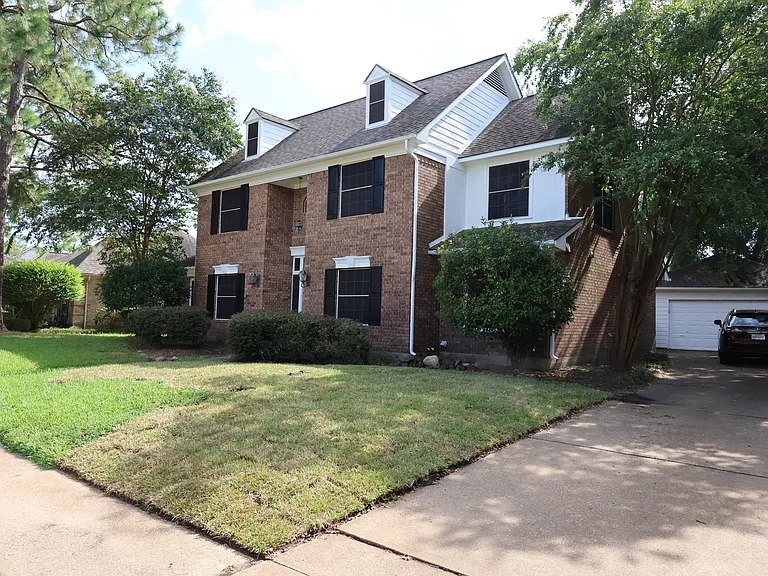Driveway to the two car garage.