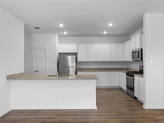 A chef-ready kitchen with granite countertops