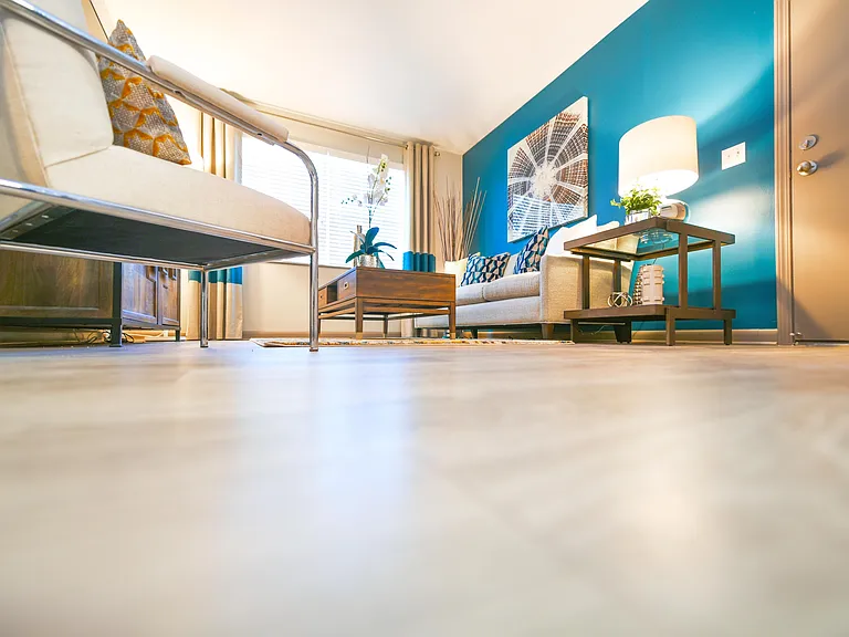Spacious living room with hardwood-style flooring