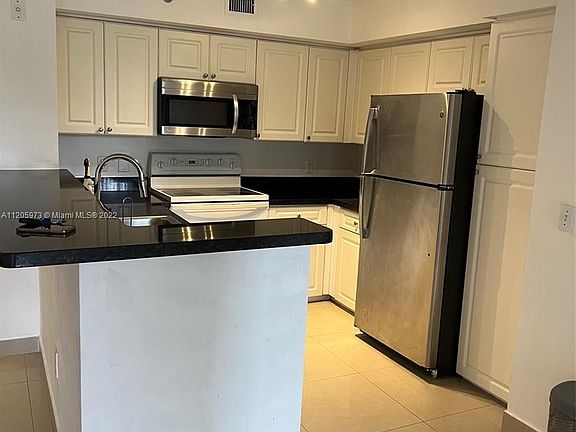 2nd image of 19501 E Country Club Dr #9203