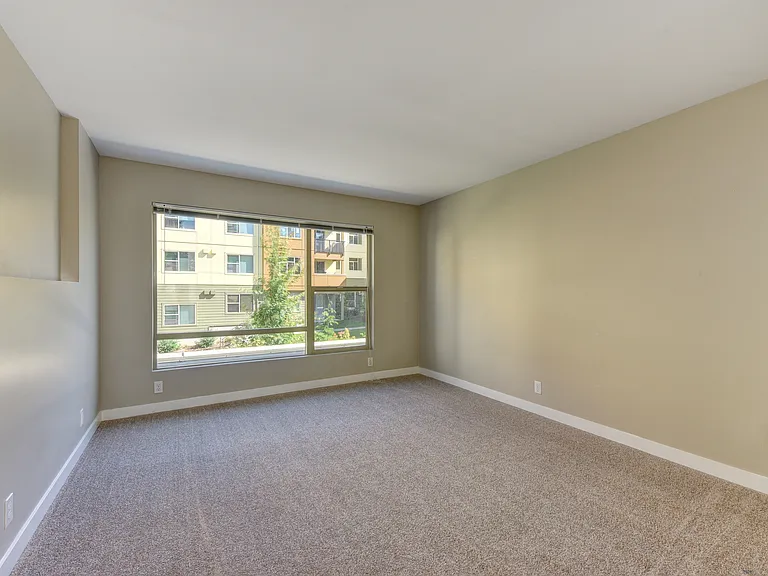 Bedroom with Large Picture Windows