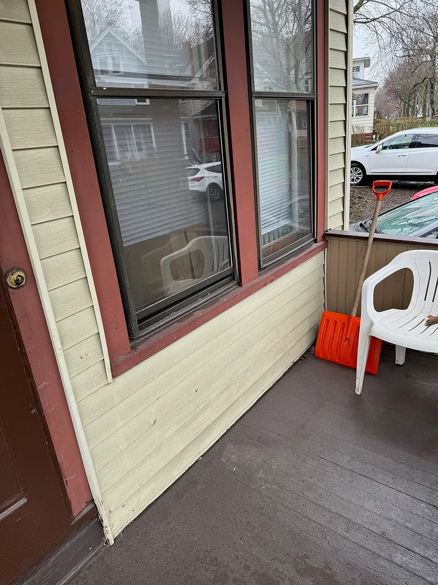 private entrance and porch on the Congress St side of house - 1075 Genesee St #7